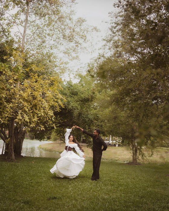 Dancing under trees, wide shot