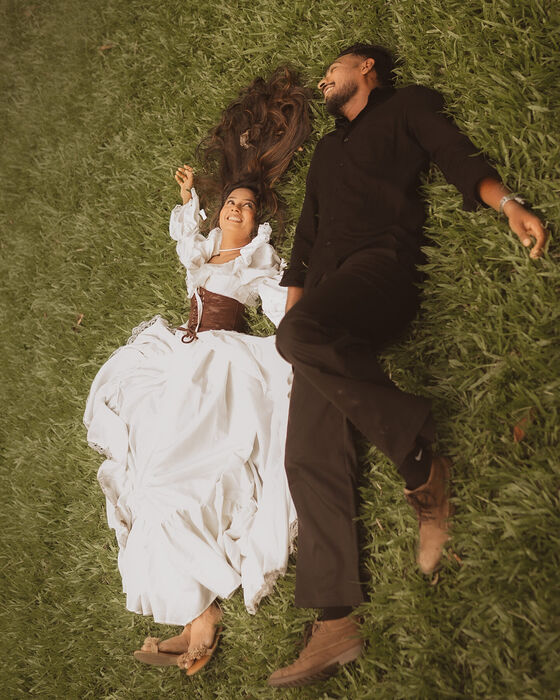 Laughing together in the grass