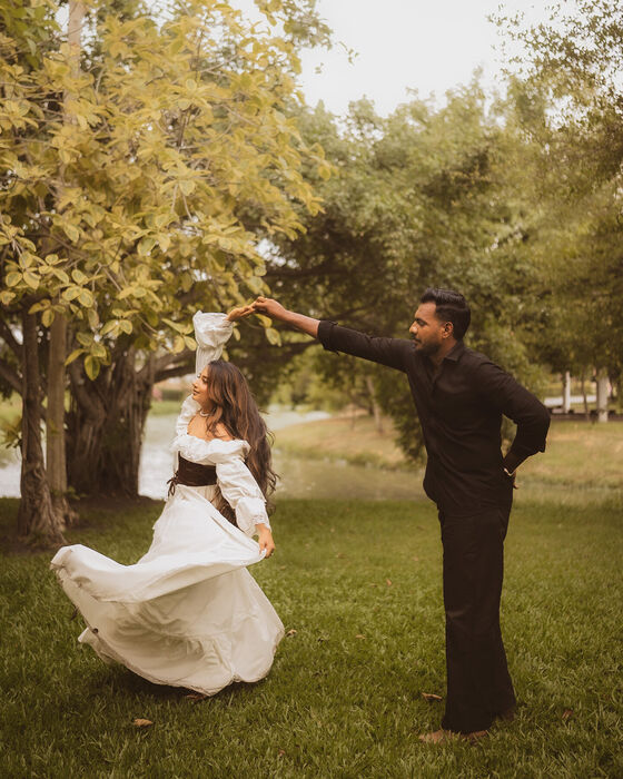Twirling dance under the trees